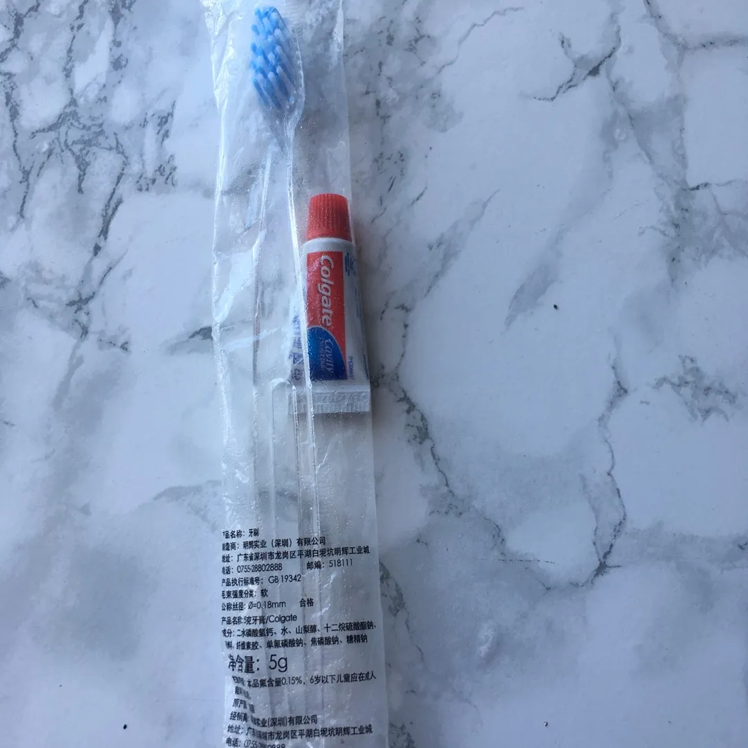 BNIB Toothbrush + Mini Toothpaste photo 1