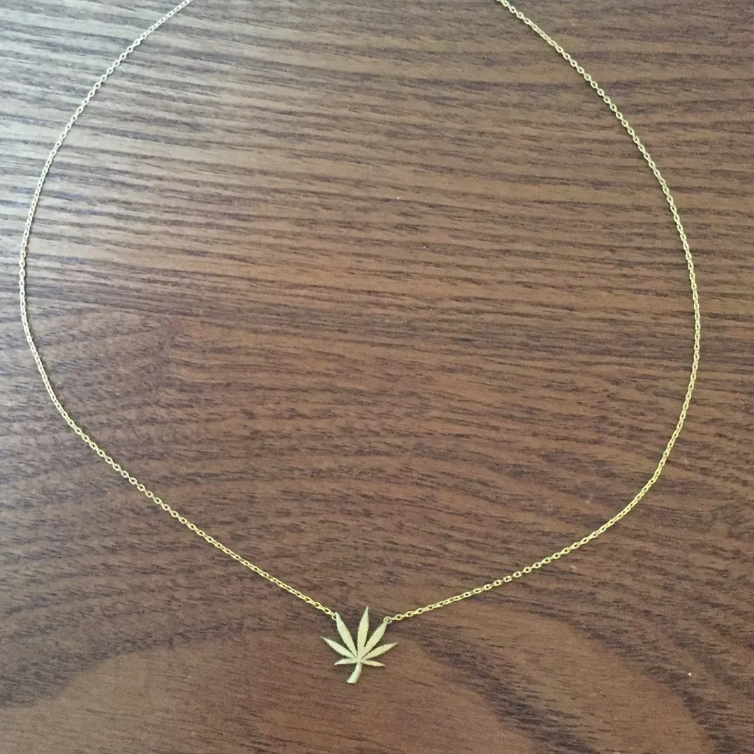 Delicate Gold Weed Leaf Necklace photo 1