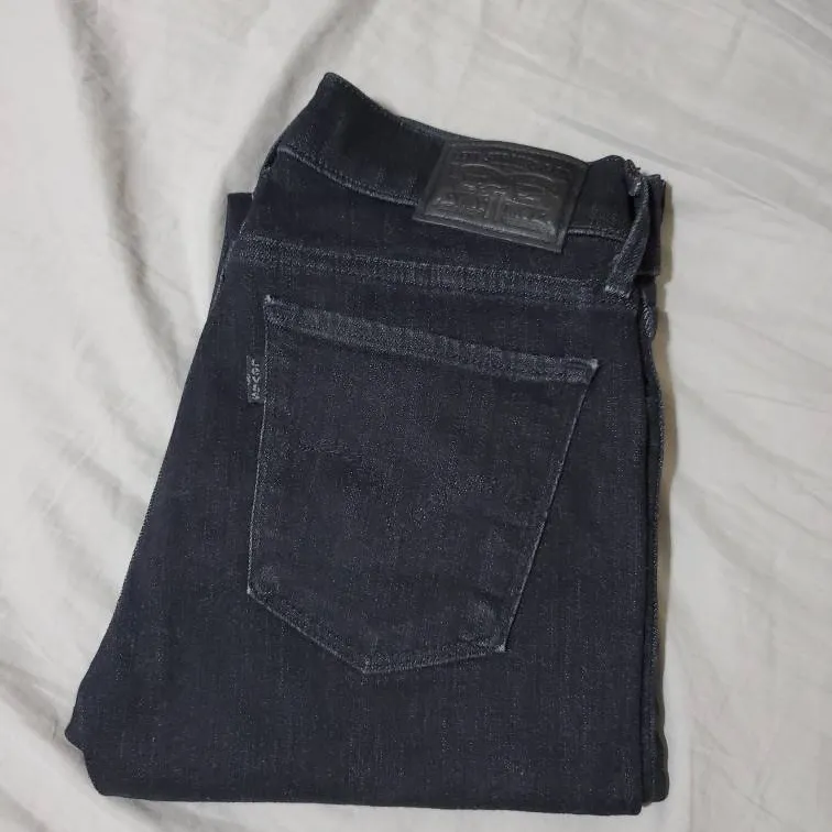Dark Washed Levi's 710 Selvedge Super Skinny Jeans photo 1