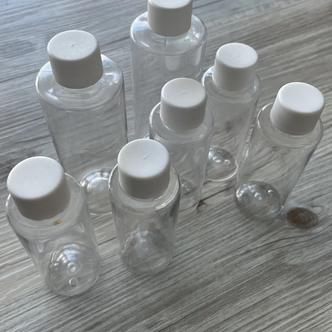 Set Of Empty Travel Size Bottles photo 1
