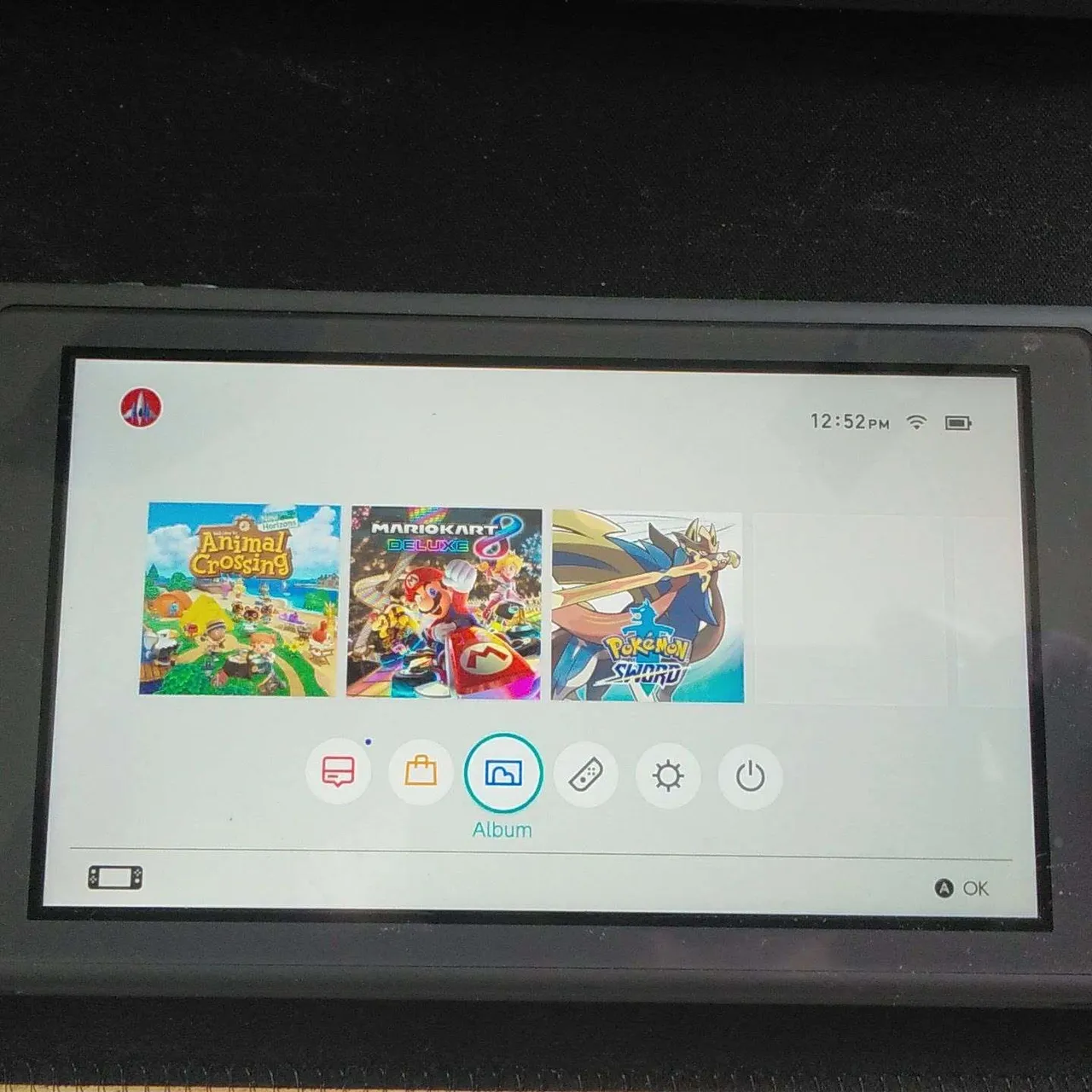 Nintendo Switch Lite + 3 Games photo 1