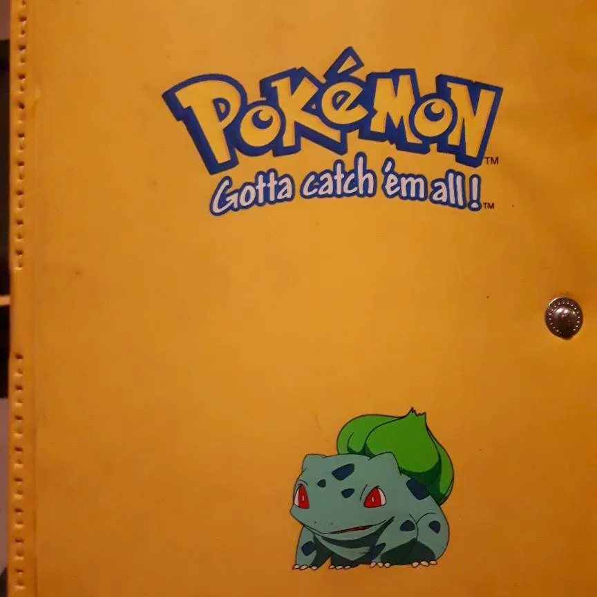 Pokemon Card Holder With A Variety Of Cards photo 1