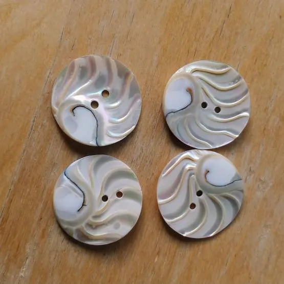 Four Shell Buttons photo 1
