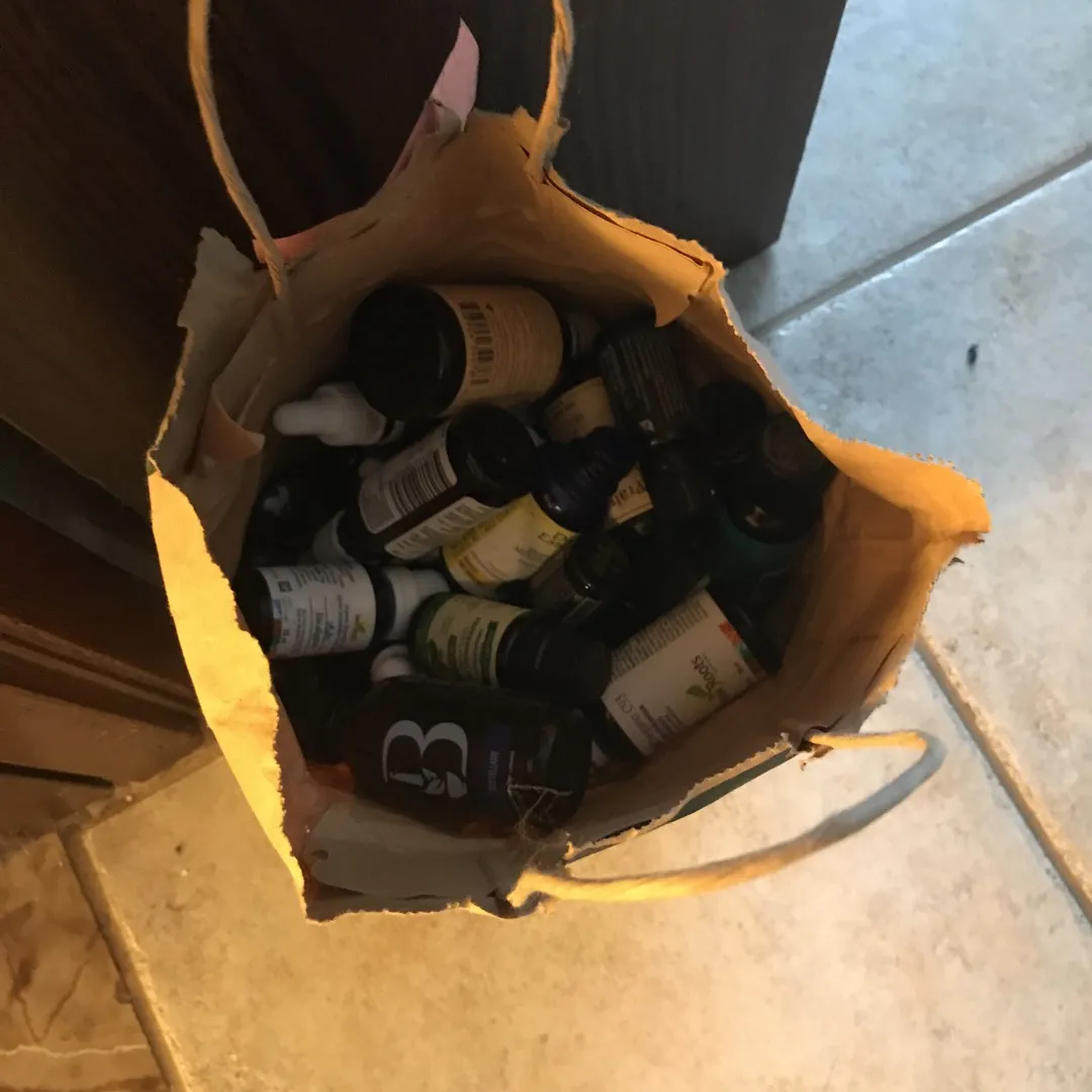 Bag Of Old Oils Bottles photo 1