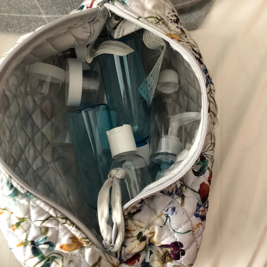 Toiletries/makeup Bag With Unused Travel Bottles photo 1