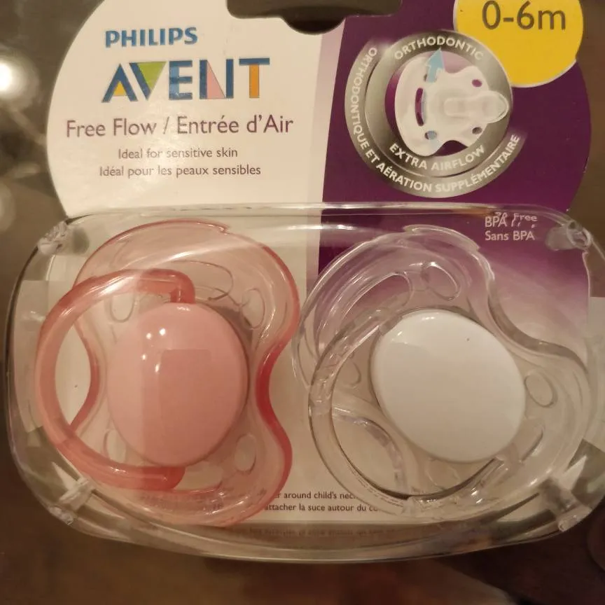 NEW - 3 Packages Of Pacifiers And 1 Baby Feeder! photo 4