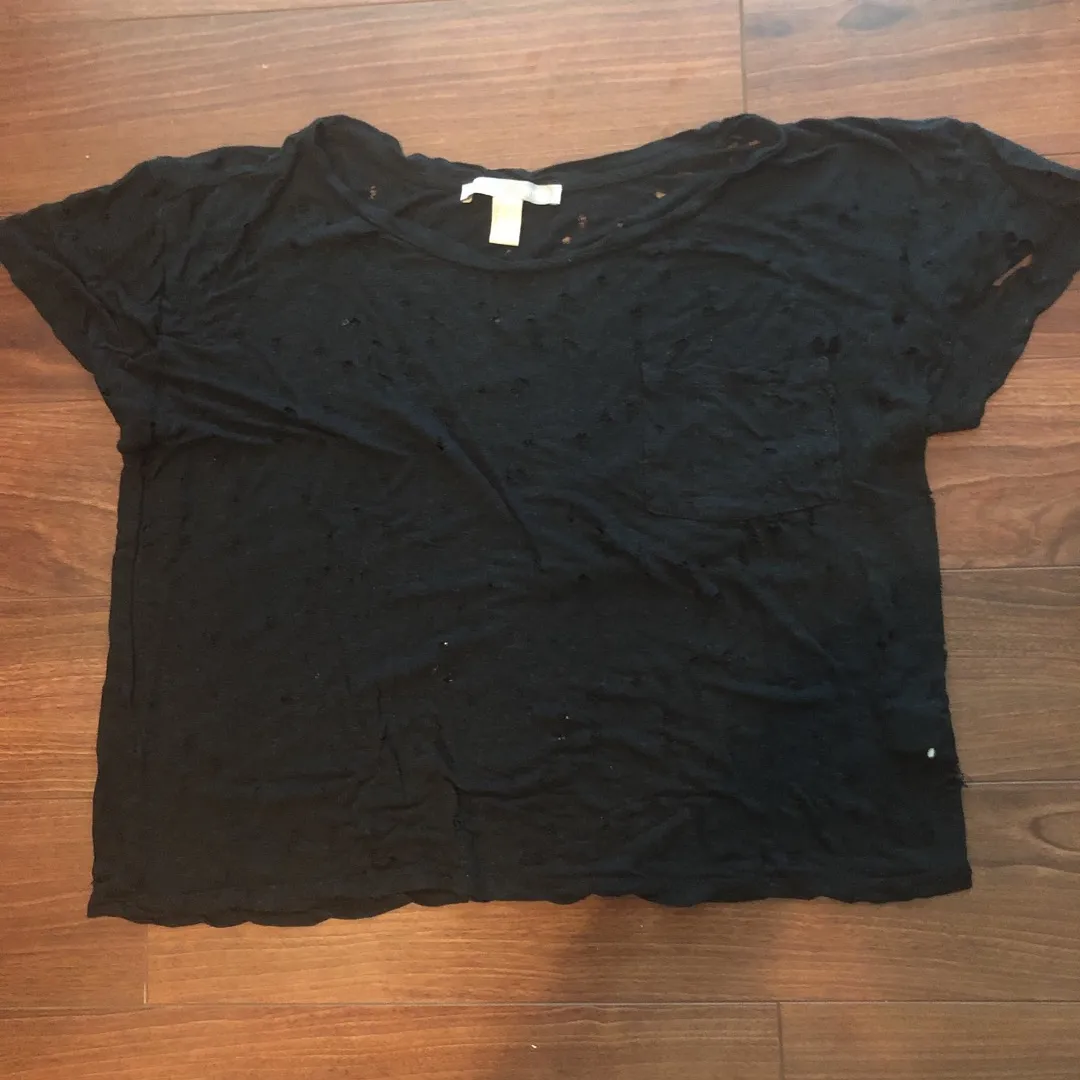 Very Distressed Black T-Shirt With Lots Of Wholes photo 1