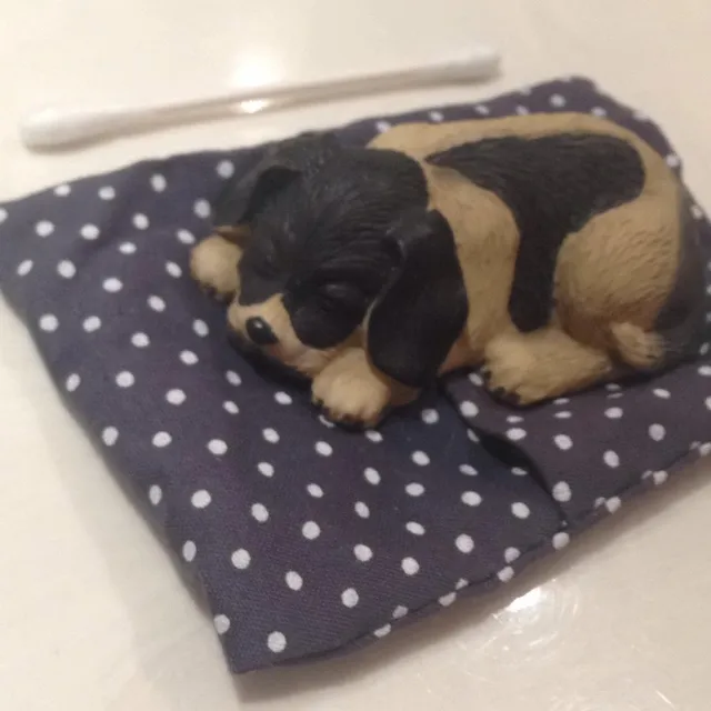 Cute Dog In Bed Sculpture photo 1