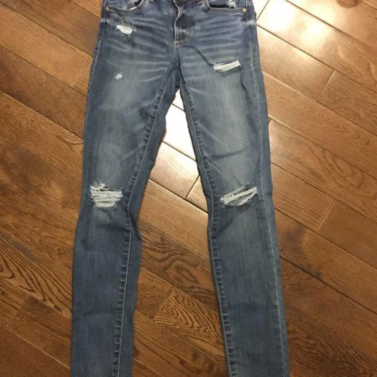 Medium Blue Faded Jeans With Tears photo 1
