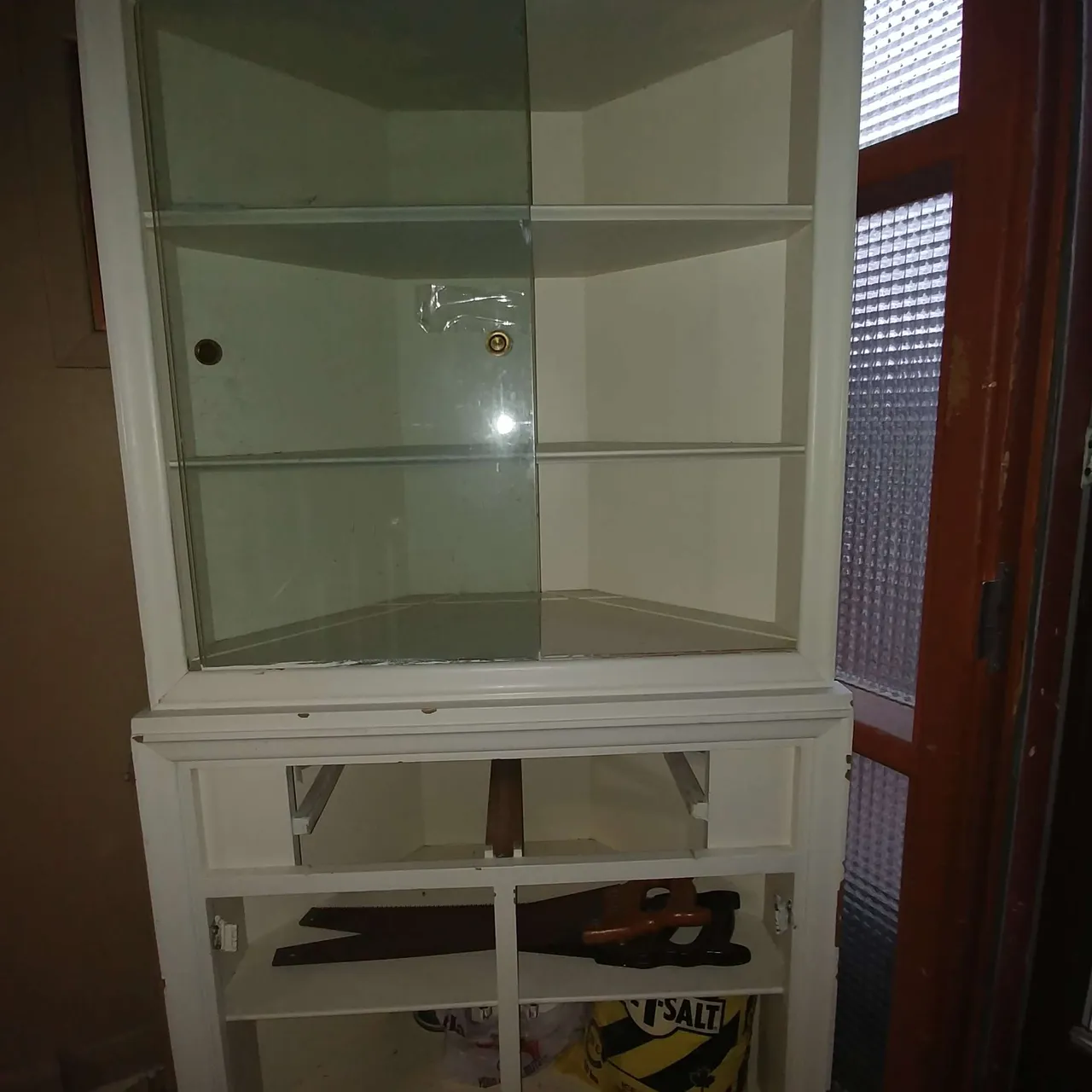 Free corner cabinet, sliding glass upper, bottom doors need n... photo 1