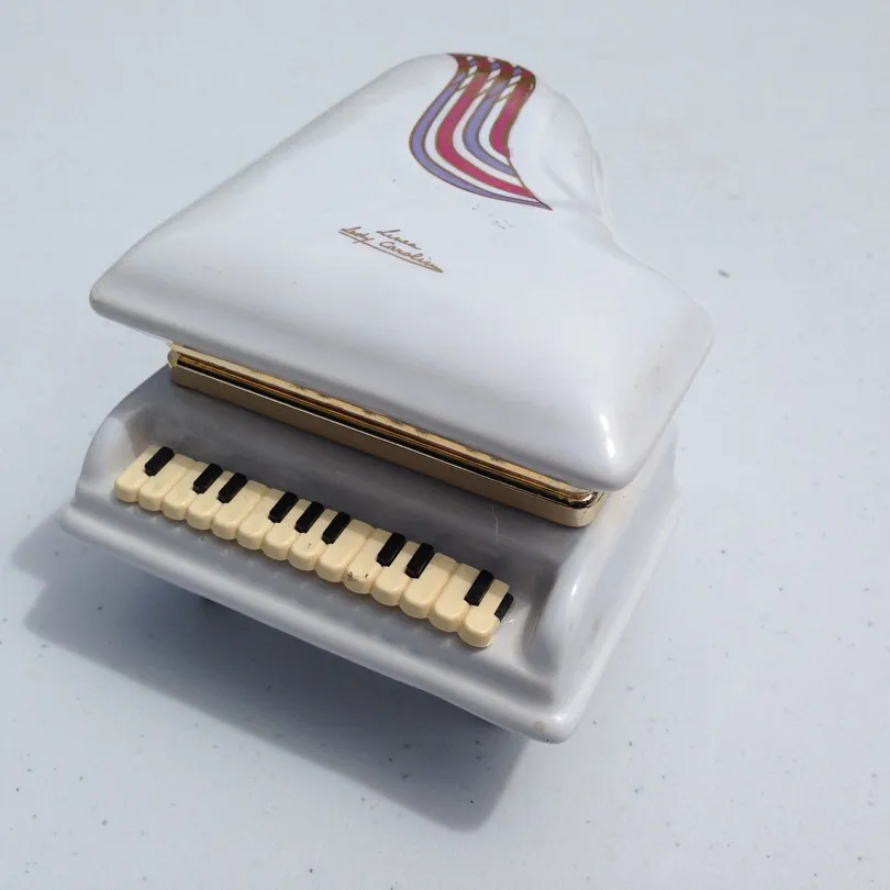 Ceramic Piano With Storage - Italy photo 1