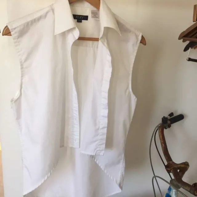 white sleeveless Oxford shirt photo 1