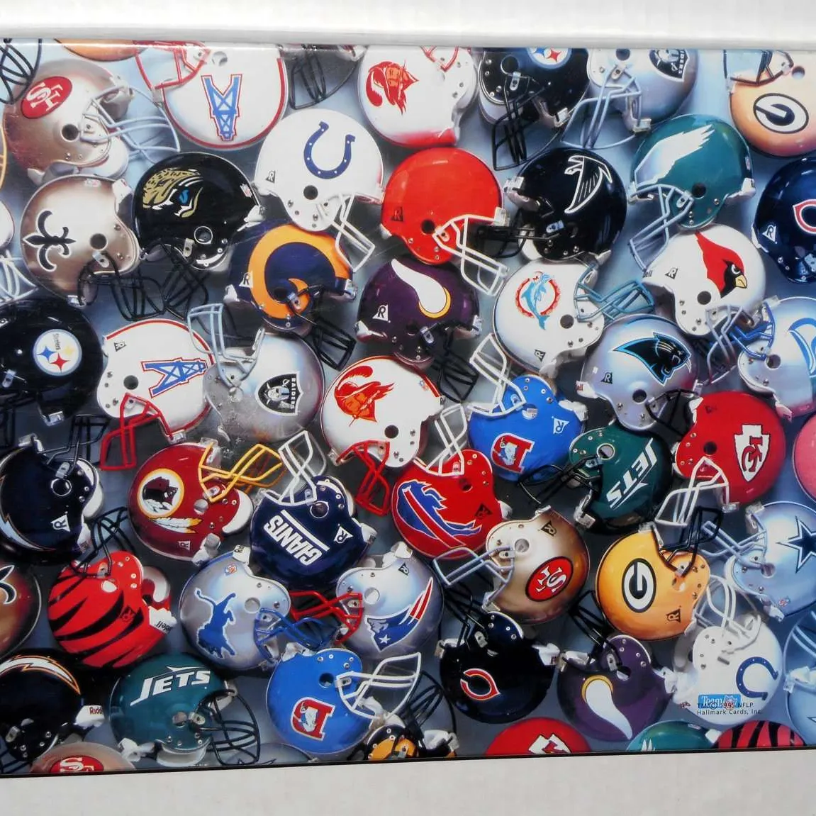 Springbok NFL Helmets puzzle photo 1