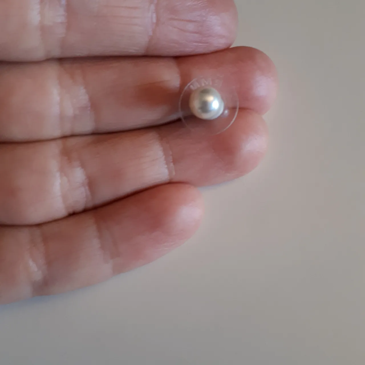 One pearl earring photo 1