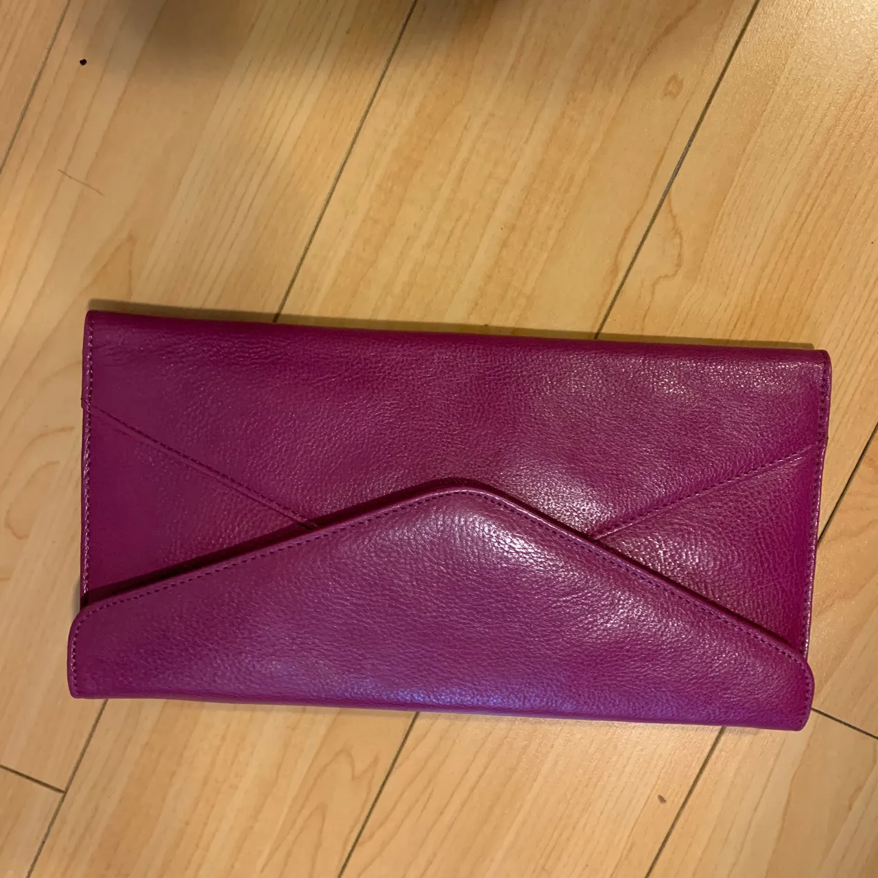 Purple Danier leather wallet. photo 1