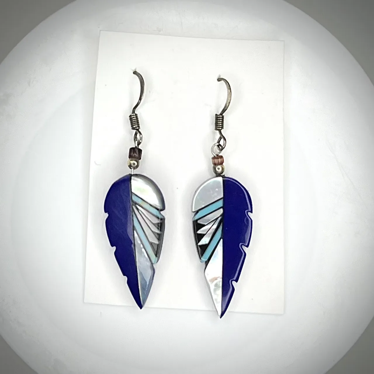 Feather dangly earrings  photo 1