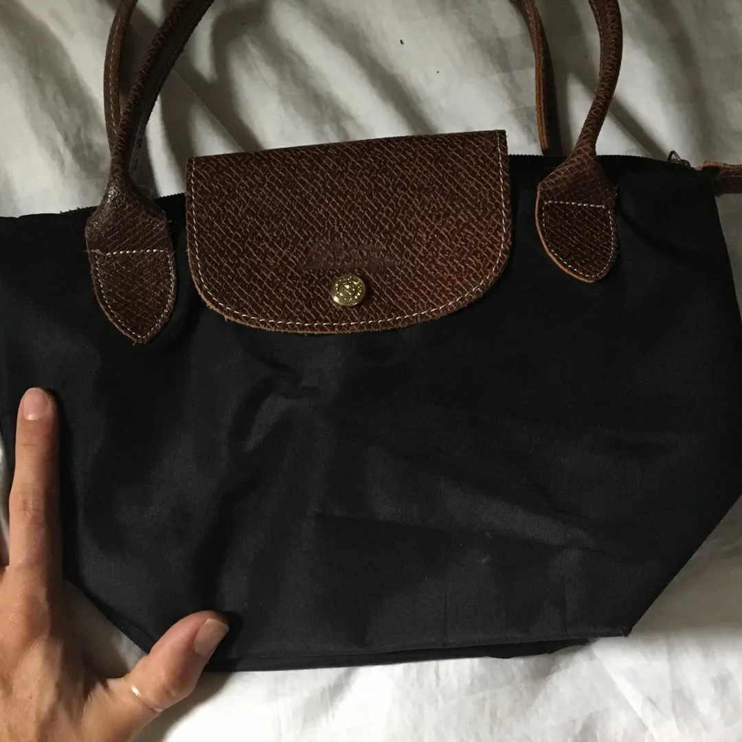 Longchamp Handbags photo 1