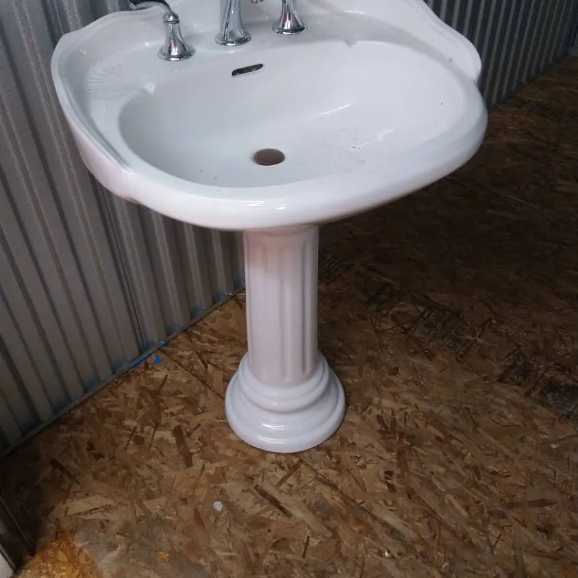 Pedestal Sink And Faucet photo 1