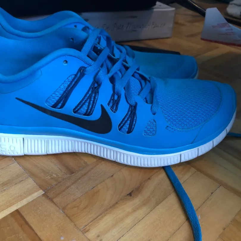 Size 8 Blue Nike Runners photo 1