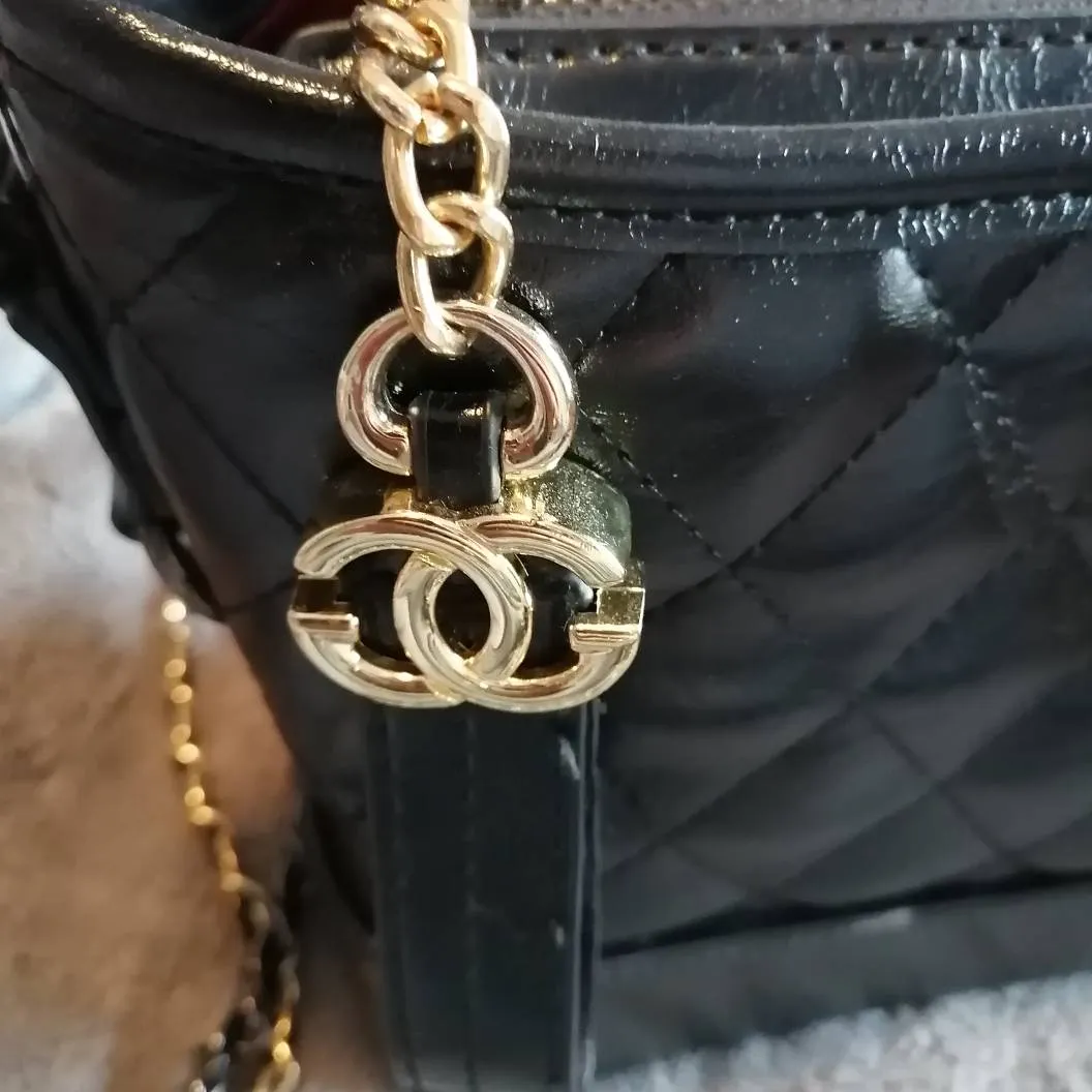 Brand New Black And Gold Purse photo 6