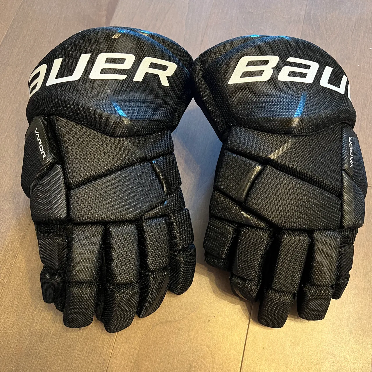 Like New Bauer Hockey Gloves photo 1