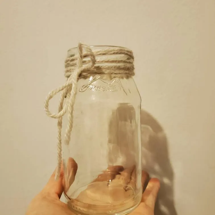 Small Glass Jar With Yarn photo 1