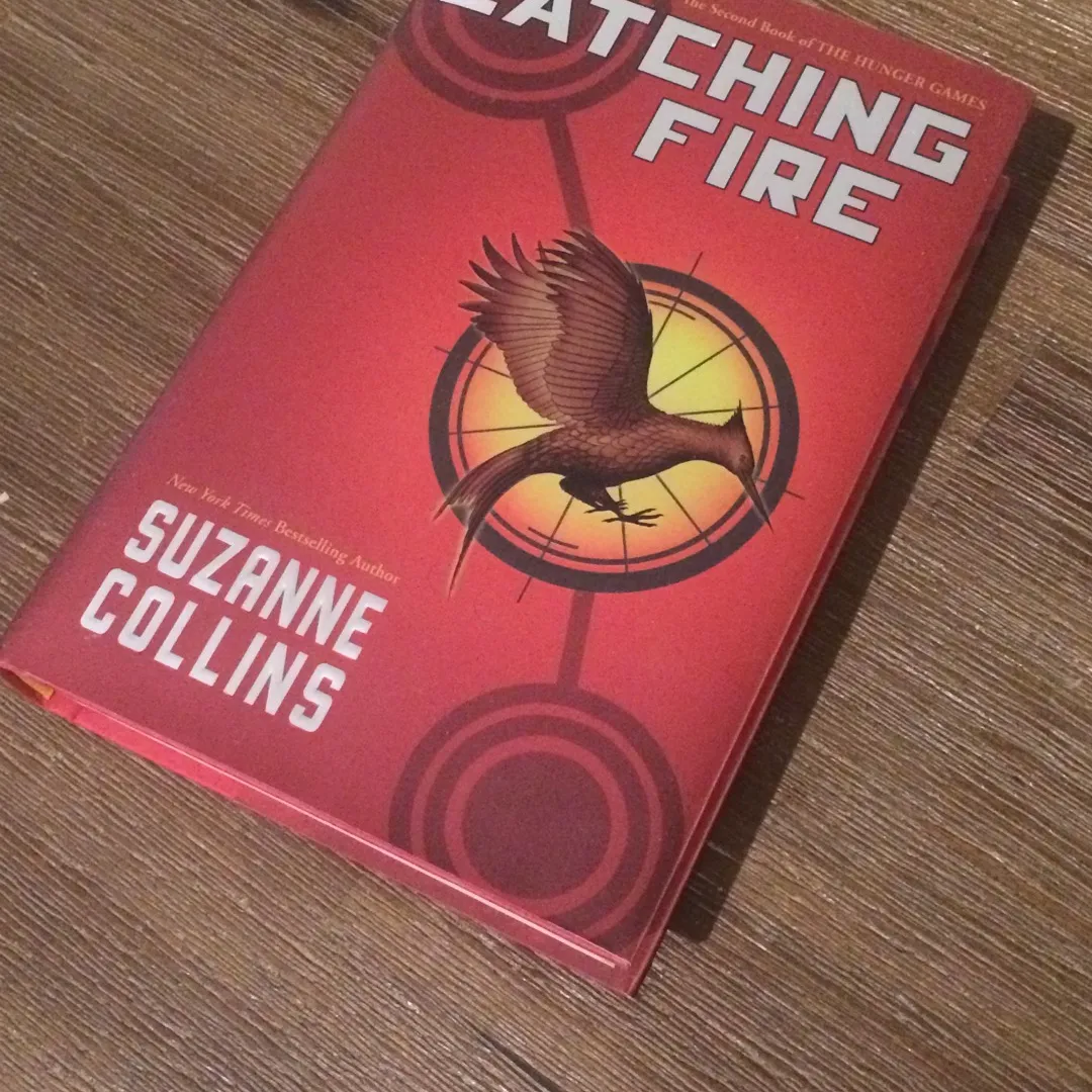 Catching Fire By Suzanne Collins photo 1
