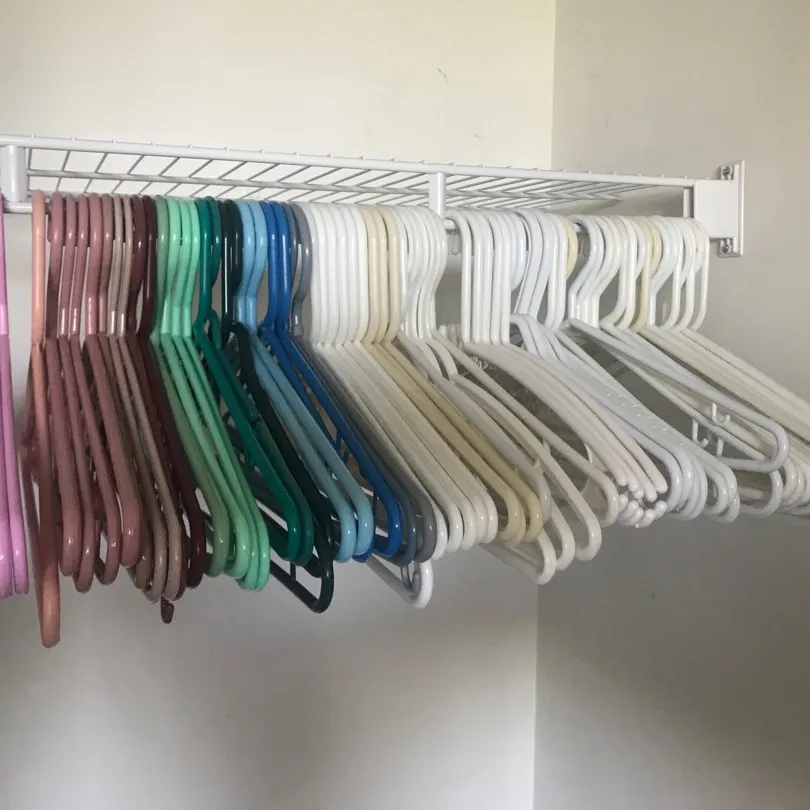 Approx 70 plastic hangers photo 1