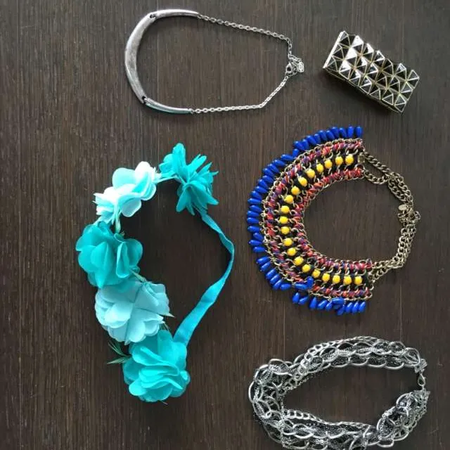 Multiple Necklaces, Bracelet And Flower Headband photo 1
